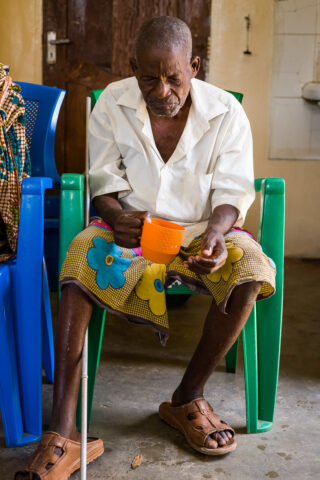 Elderly man with a cup of tea